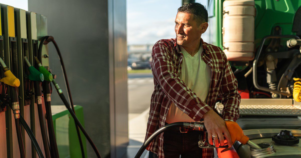 Man fueling up truck